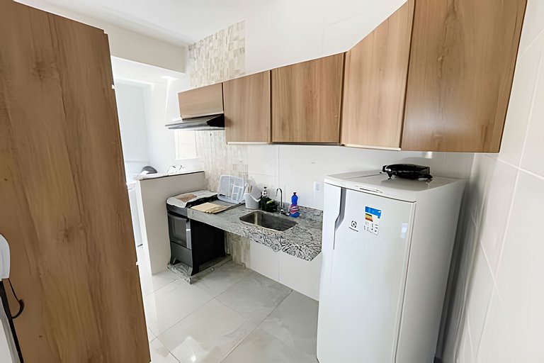 Apto de 2/4 com ar, garagem e cozinha completa