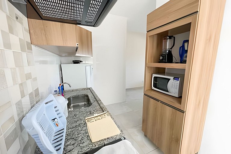 Apto de 2/4 com ar, garagem e cozinha completa